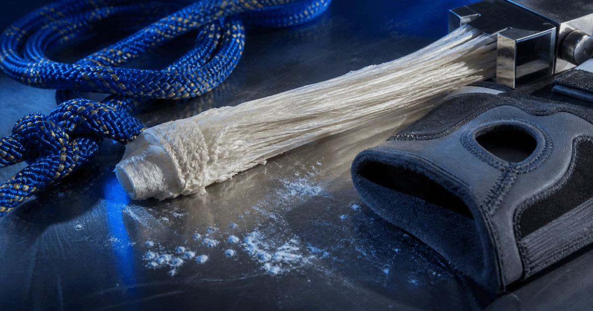 Braided cord, tendon-like fibers, and an ankle brace arranged for a tendon recovery research guide.