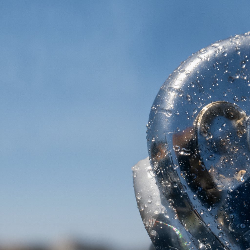 Chrome and water-droplet still-life detail