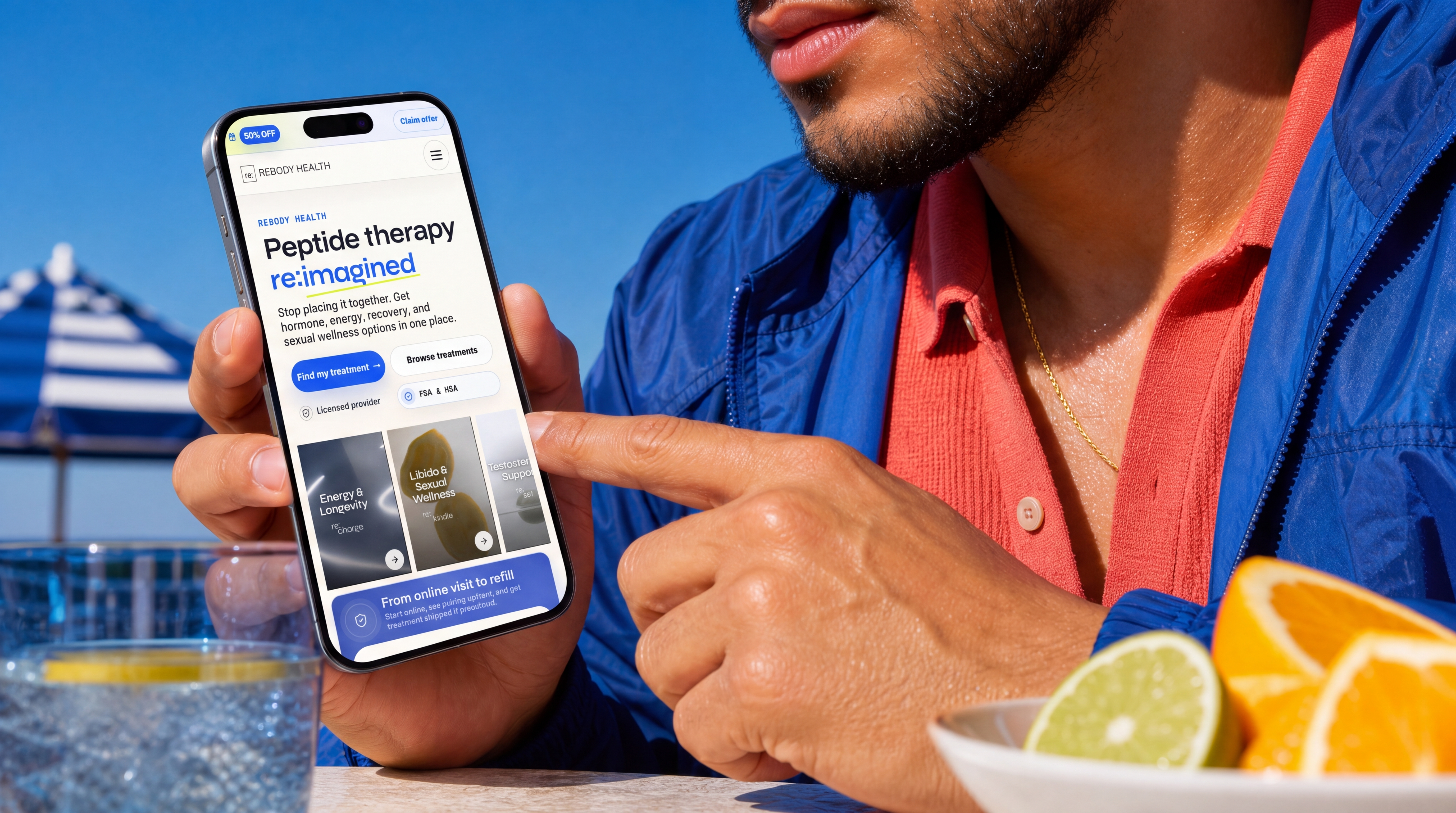 Man in a cobalt jacket viewing the Rebody mobile homepage on a smartphone.