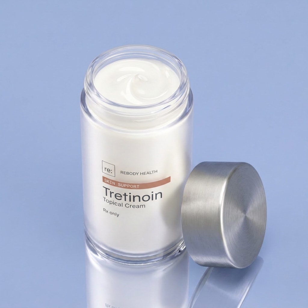 The open tretinoin jar from above, showing the smooth white cream.