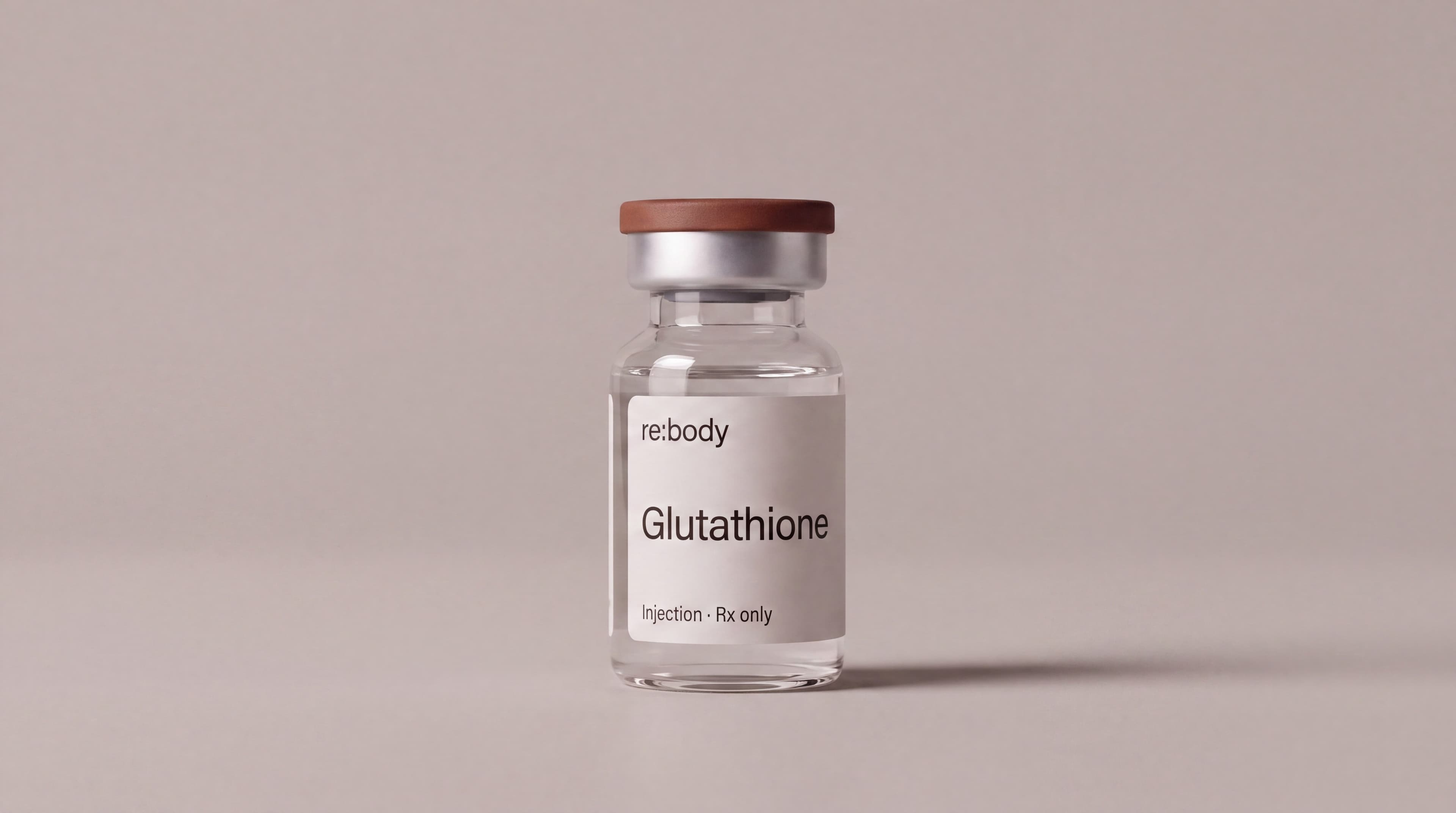 Rebody glutathione injection vial beside reflective green glass in sunlight.