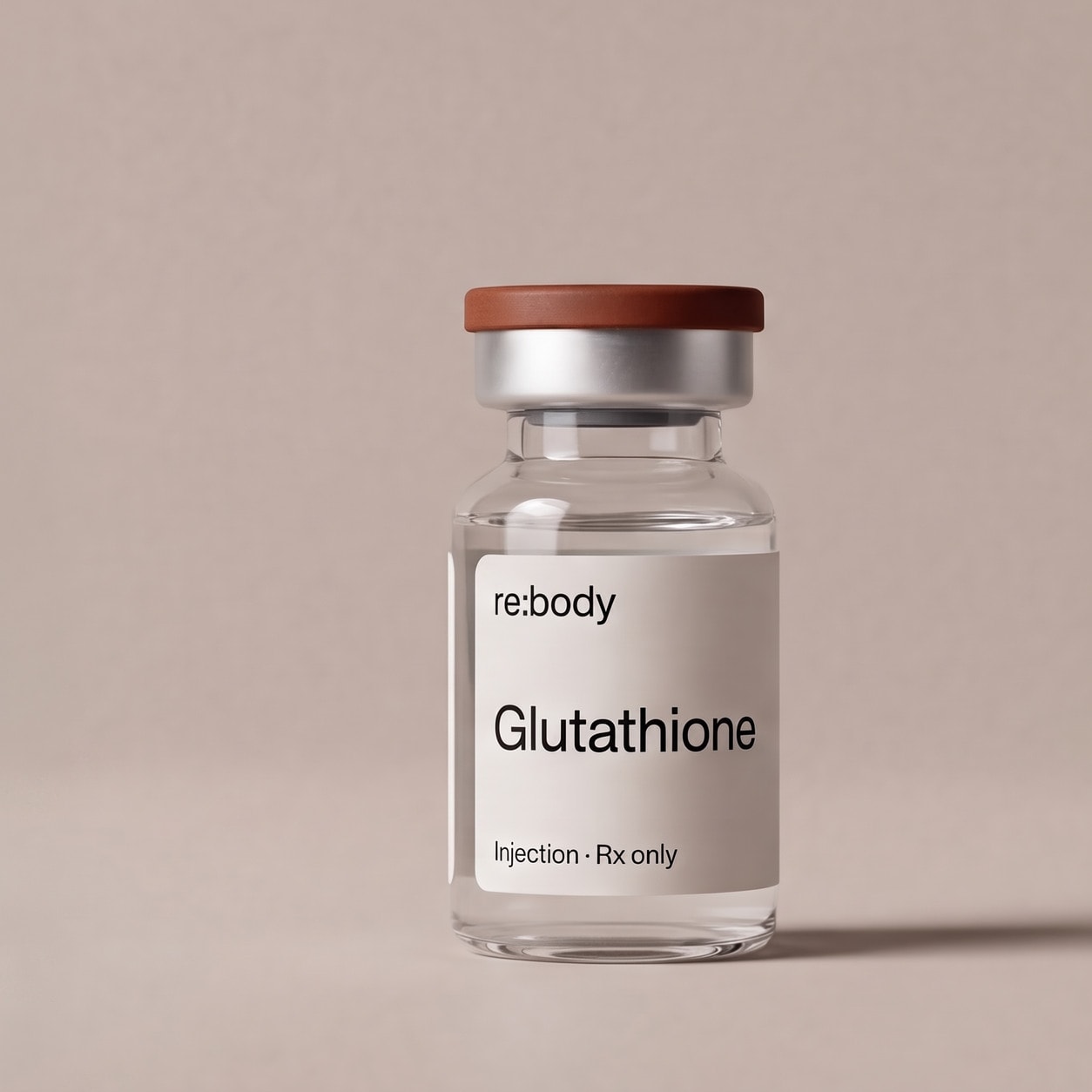 A Rebody glutathione injection vial on a warm sand-toned surface.