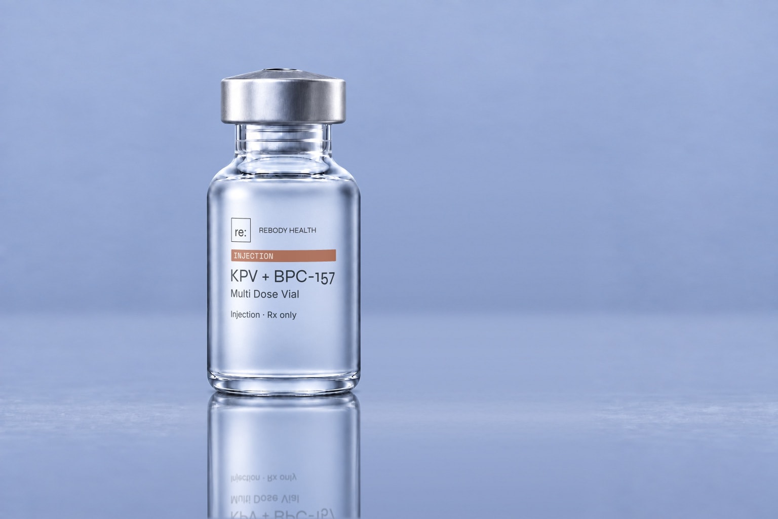 Frosted Rebody KPV + BPC-157 combination vial on a glossy slate-blue surface.