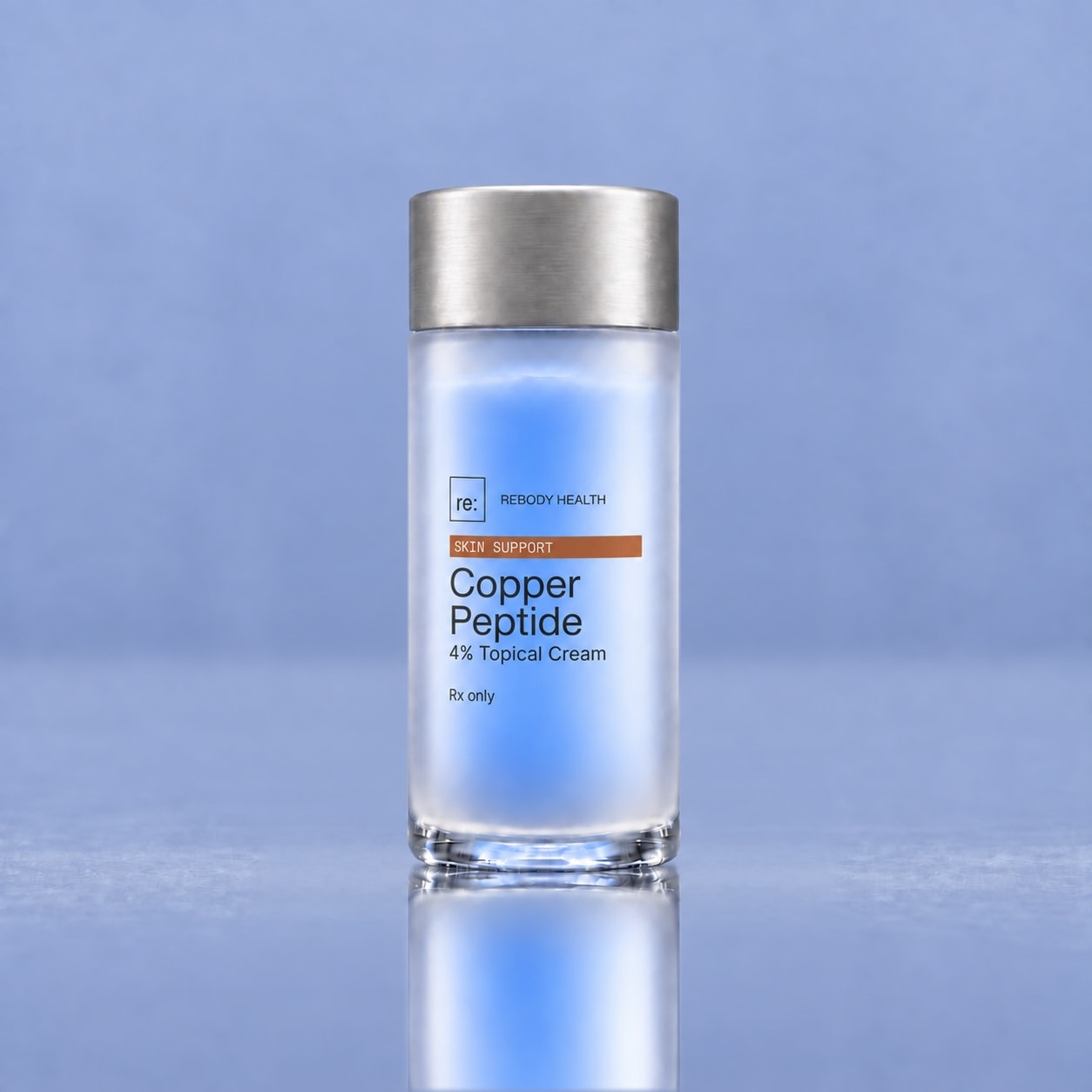 Rebody Copper Peptide 4% blue cream in a frosted container on a glossy slate-blue surface.