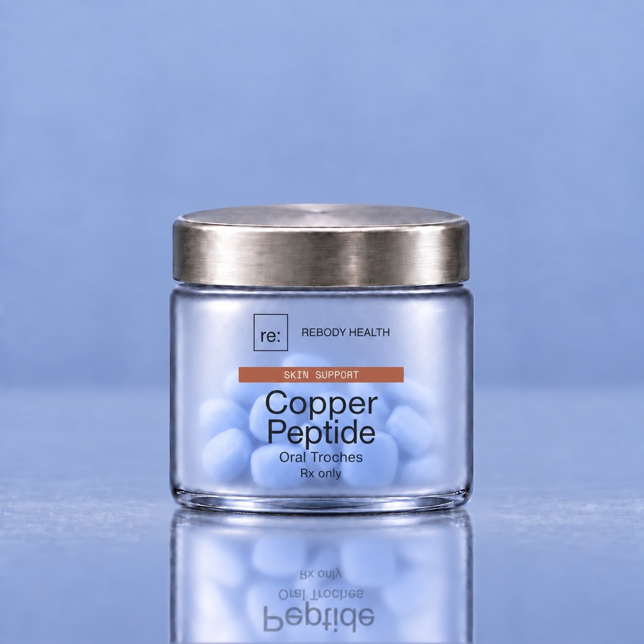 Rebody Copper Peptide oral troches in a frosted jar with a silver lid.