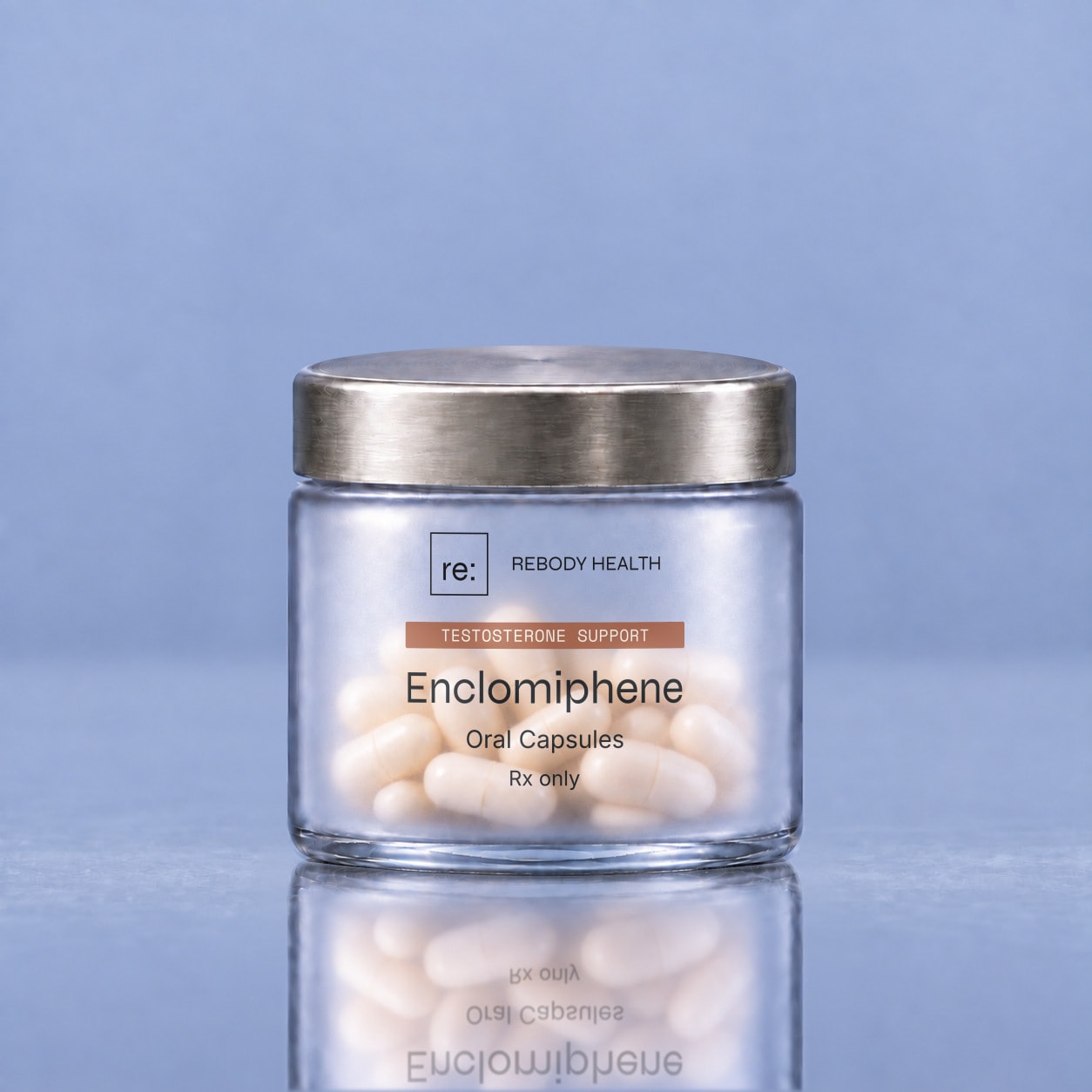 Rebody Enclomiphene capsules in a frosted jar with a silver lid.