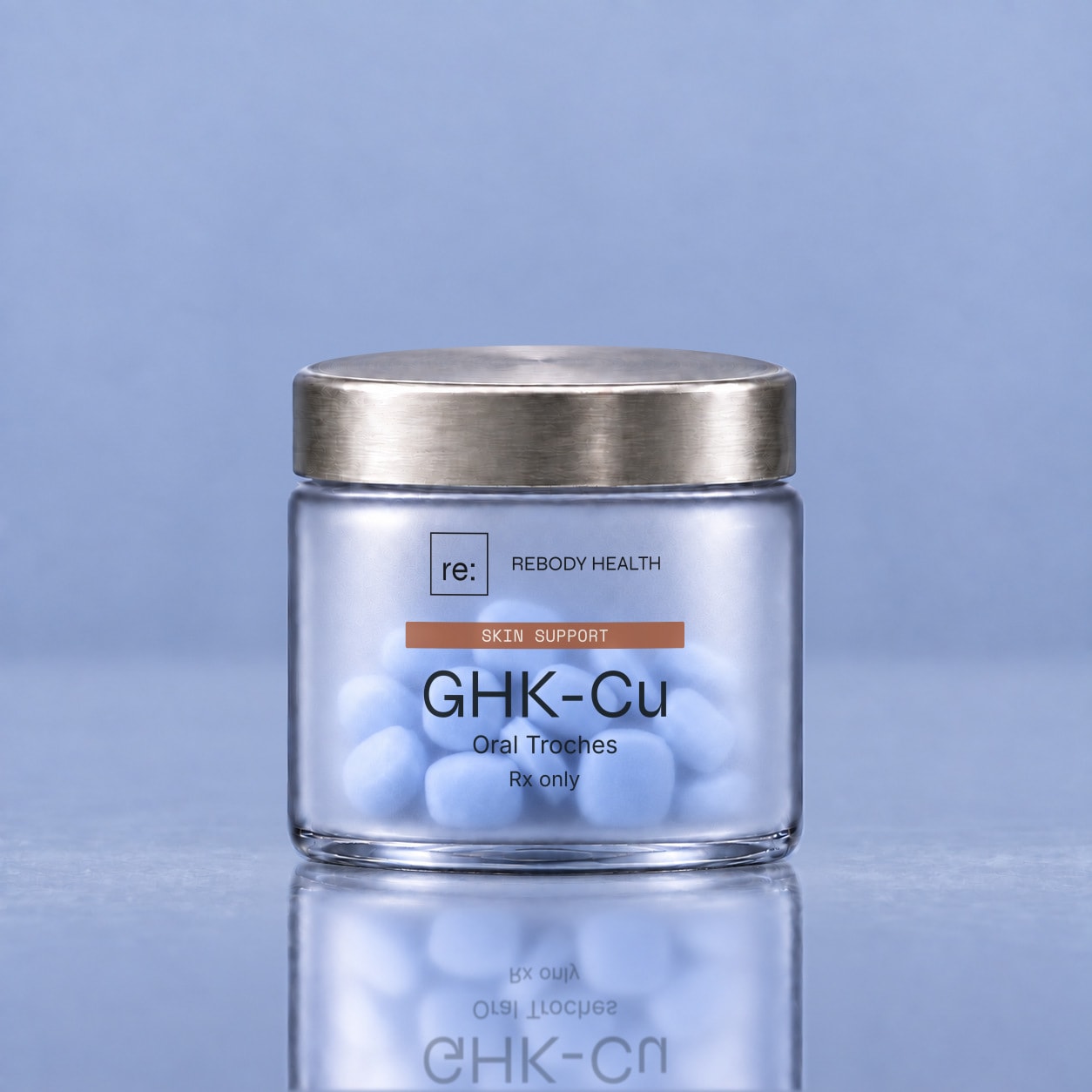 Rebody GHK-Cu oral troches in a frosted jar with a silver lid.