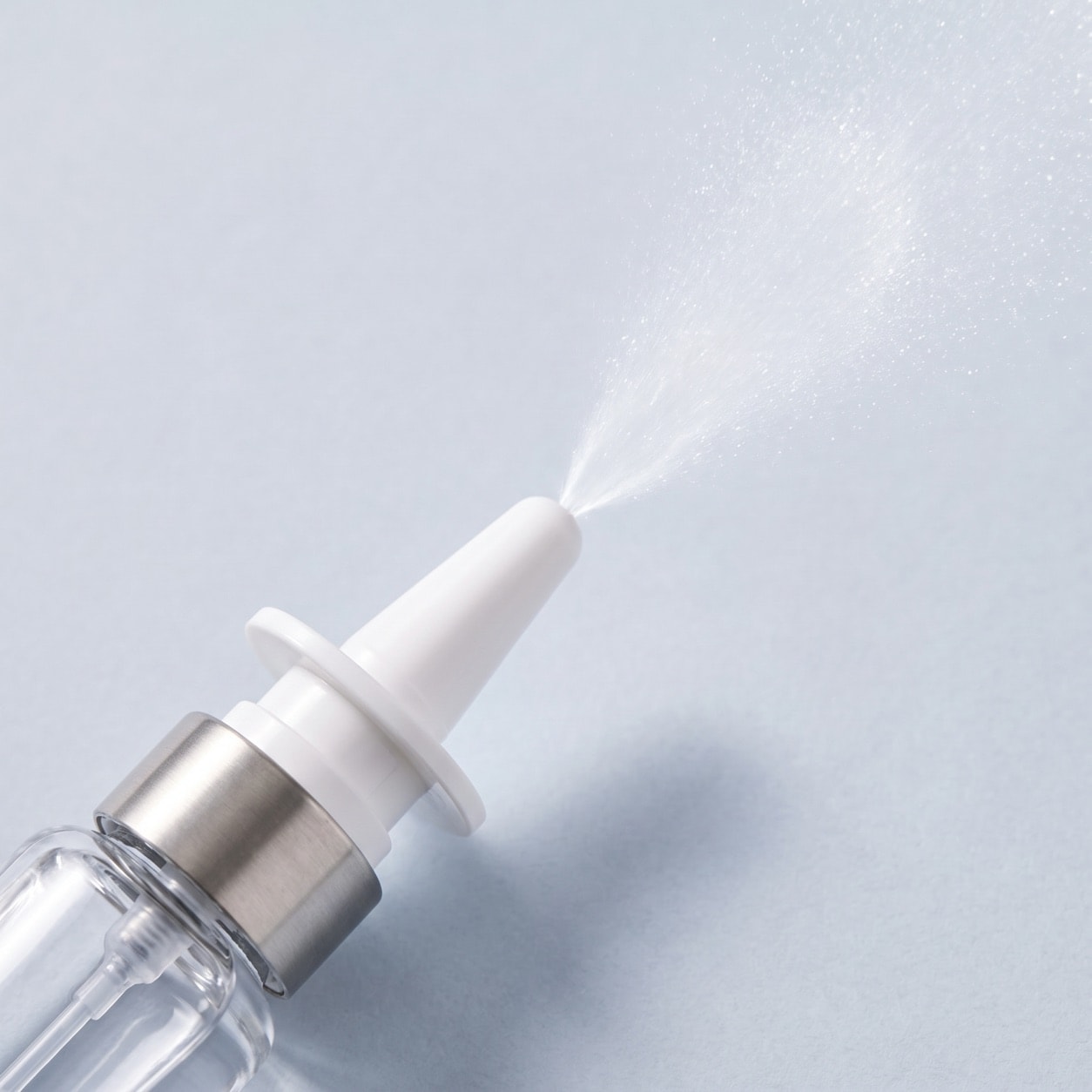 A close-up of the oxytocin nasal spray.